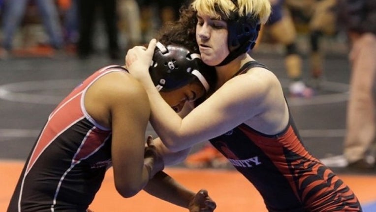 9f4cd99b-Transgender boy wins controversial girls state title_1488217461912.jpg