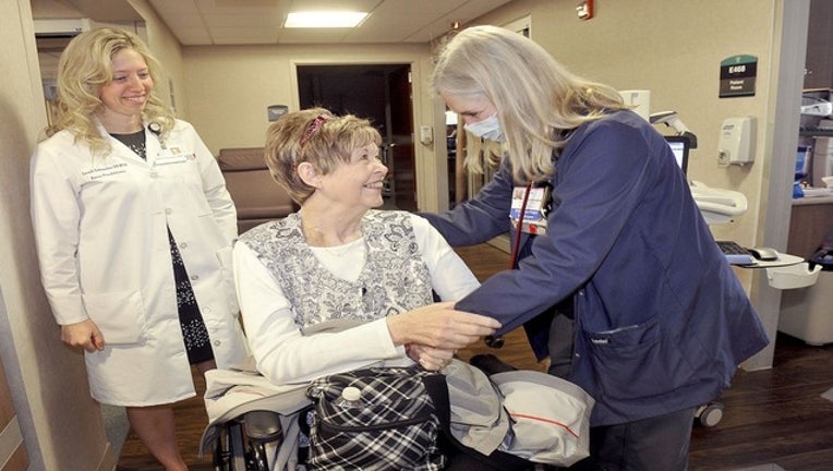 7e2ea474-Woman saved_1488162068128.jpg