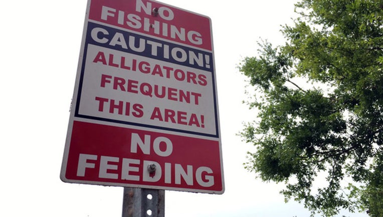 36f44447-alligator pond sign_1463068579479-401385.jpg