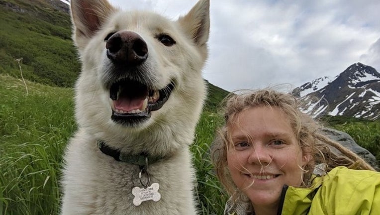 870dc458-amelia_milling_hiker_saved_by_husky_070118_1530464972639-401096.jpg