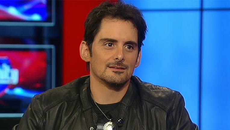 941e2267-brad-paisley_1471377594633.jpg