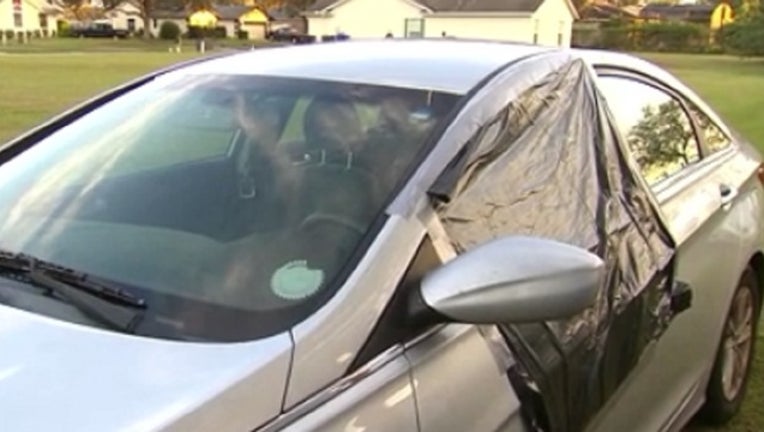 171058f0-broken car window_1511752588873.jpg