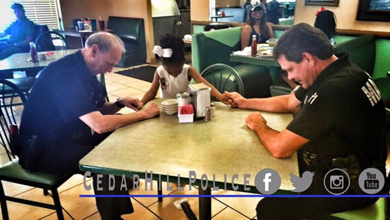 d2225593-cedar hill police prayer_1464808862118-409650.jpg
