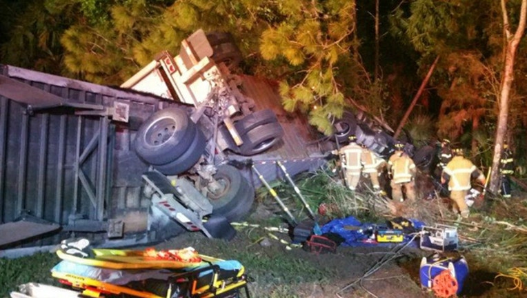 0236c905-flager overturned truck_1511373153316.jpg