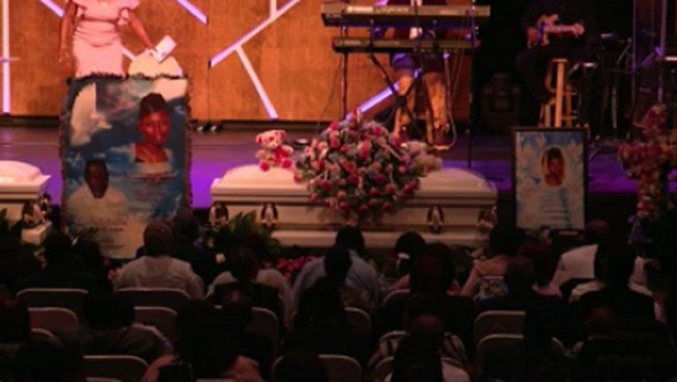 f17fbd51-funeral for Tashaun Jackson_1551575200982.jpg.jpg