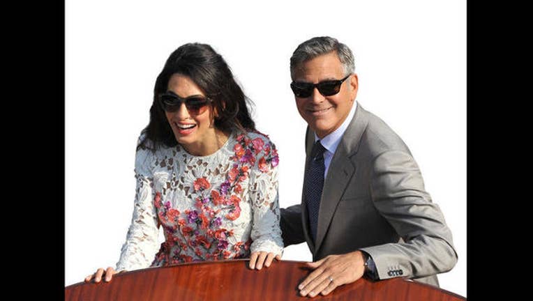 61d37c9c-george and wife_1486673372114-401096.jpg