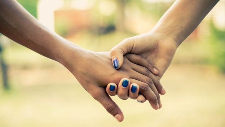 holding_hands_generic_01_032619_1553605613832-401096.jpg