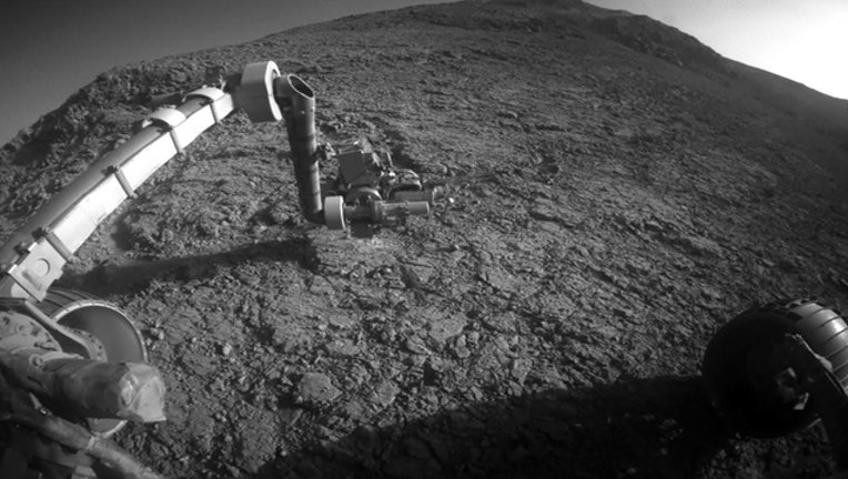 201b3e67-mars-opportunity-rover_1550018265002.jpg