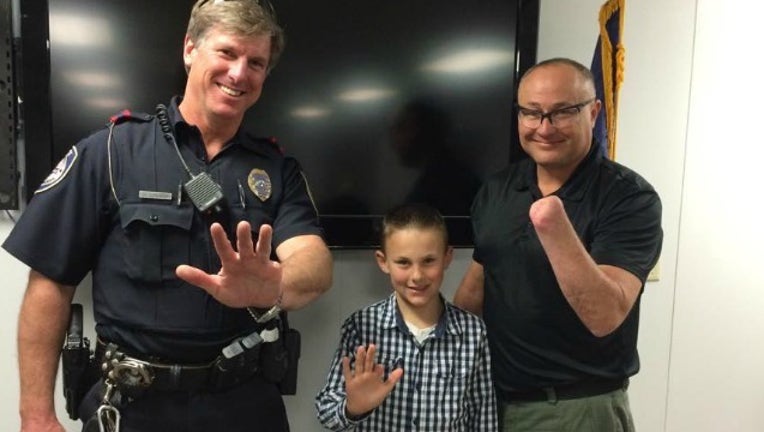 6cca8c0d-police support boy_1457365242127-404959.jpg