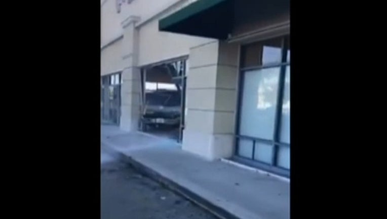 d78e1c0c-suv into phone store_1484441157959.jpg