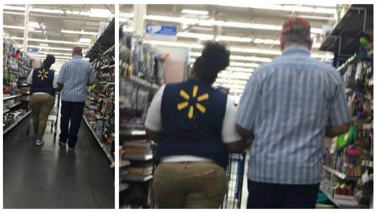 16b0f746-walmart employee helps man_1500549857736-404959.jpg