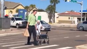 Publix employee helps elderly woman cross busy Florida street