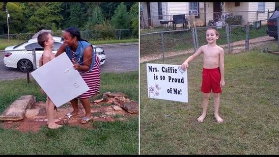 Teacher puts congratulatory yard sign in front of student's home after he aces reading test