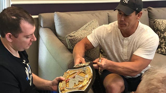 John Cena visits injured Colorado Springs police officer