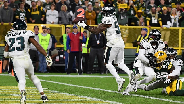 Eagles pick off Rodgers' late pass, beat Packers 34-27