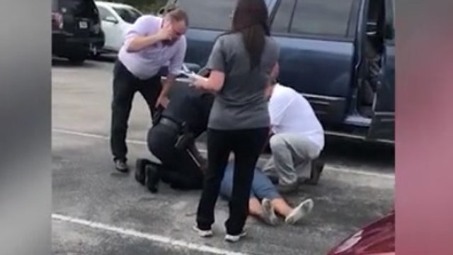 Good Samaritans jump in to save woman's life at tax collector's office