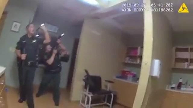 Burglary suspect caught climbing through ceiling