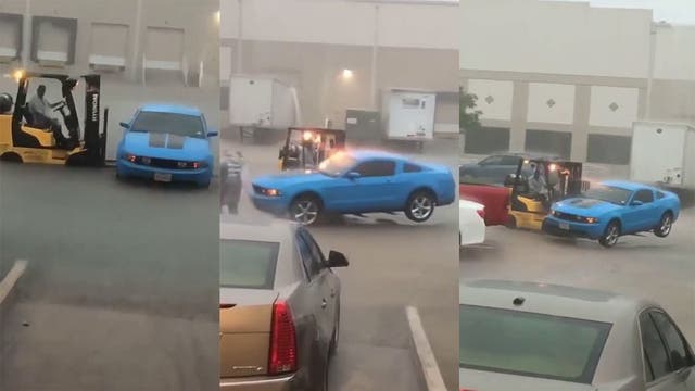 Quick-thinking coworker saves man's car from Imelda flood with forklift