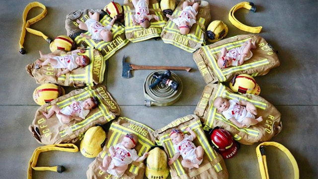 Fire department holds photo shoot for 9 babies born within months of each other