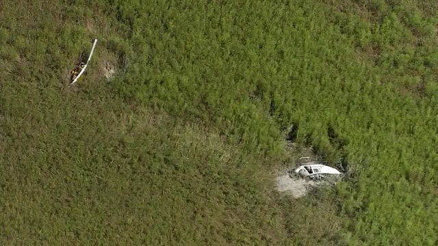 Pilots survive after two helicopters crash into rural Polk swamp