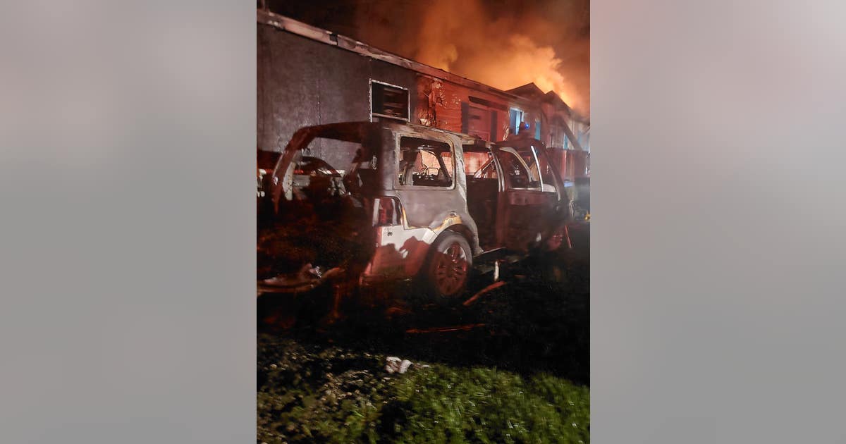 Family, pets rescued after car fire destroys mobile home in Orange ...