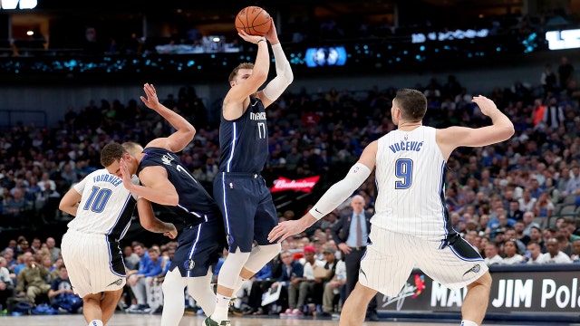 Doncic's 27, late charge calls help Mavs top Magic 107-106