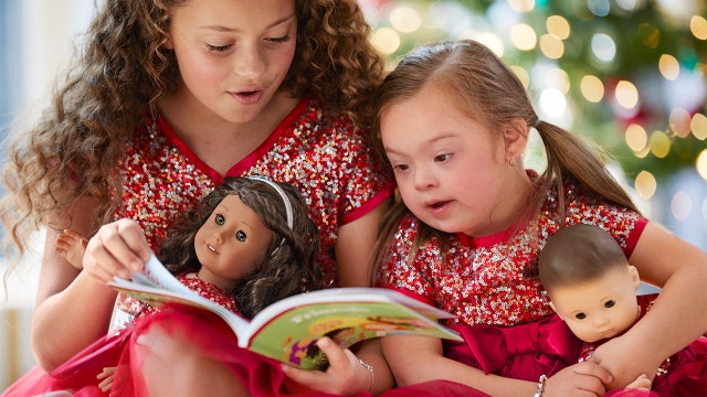 American Girl holiday catalog features ‘electric’ 4-year-old girl with Down syndrome in dazzling red gown