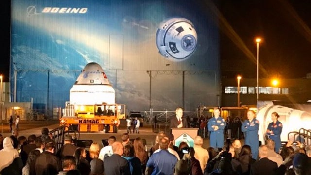 Boeing rolls out Starliner crew capsule at Kennedy Space Center