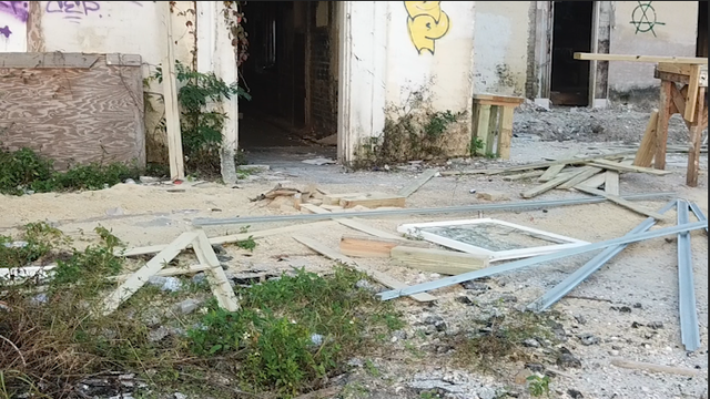 Vandals damage windows as owner tries to restore historic DeLand hotel
