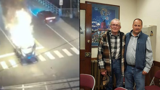 Video shows man pulling elderly driver from burning car after it exploded