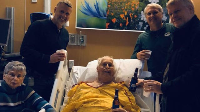 Dad shares one last beer with sons in photo taken hours before cancer death