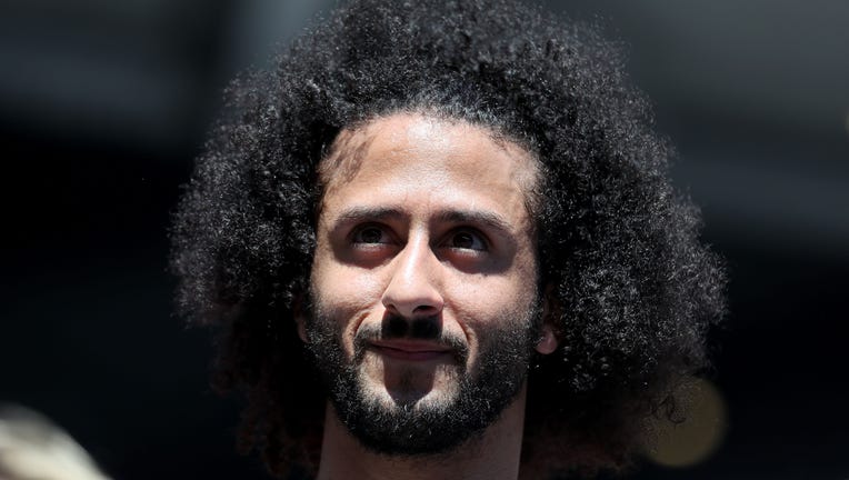 Former San Francisco 49er Colin Kaepernick watches a Women's Singles second round match between Naomi Osaka of Japan and Magda Linette of Poland on day four of the 2019 US Open at the USTA Billie Jean King National Tennis Center on August 29, 2019 in Queens borough of New York City. (Photo by Al Bello/Getty Images)