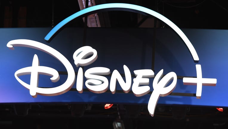 A Disney+ streaming service sign is pictured at the D23 Expo, billed as the 