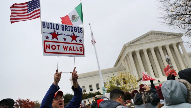 Hundreds of people gather outside the U.S. Supreme Court to rally in support of the Deferred Action on Childhood Arrivals program as the court hears arguments about DACA November 12, 2019 in Washington, DC. (Photo by Chip Somodevilla/Getty Images)