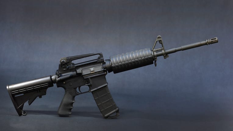 MIAMI, FL - DECEMBER 18: In this photo illustration a Rock River Arms AR-15 rifle is seen on December 18, 2012 in Miami, Florida. The weapon is similar in style to the Bushmaster AR-15 rifle that was used during a massacre at an elementary school in Newtown, Connecticut. Firearm sales have surged recently as speculation of stricter gun laws and a re-instatement of the assault weapons ban following the mass shooting. (Photo illustration by Joe Raedle/Getty Images)