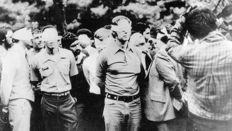 Tehran, Iran. This photo taken on the first day of occupation of the U.S. Embassy in Tehran shows American hostages being paraded by their militant Iranian captors. The picture was obtained by UPI after the FBI showed no interest. It was brought into the U.S. by an Iranian.
