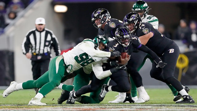Jackson, Ravens beat Jets 42-21 to clinch AFC North title