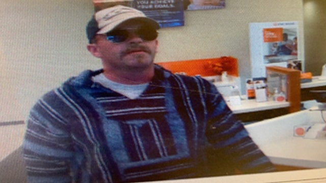 Melbourne Police searching for bank robbery suspect