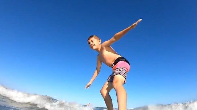 Boy knocked off surfboard by shark at New Smyrna Beach