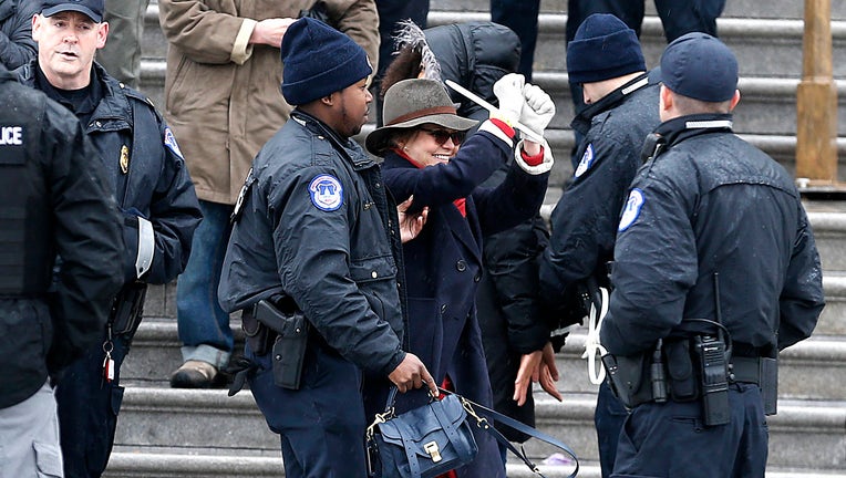 WASHINGTON, DC - DECEMBER 13: Sally Field is arrested during