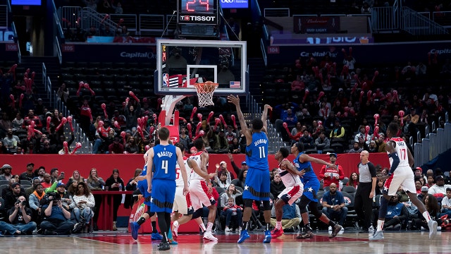 Augustin, Vucevic lead Magic past Wizards 122-101