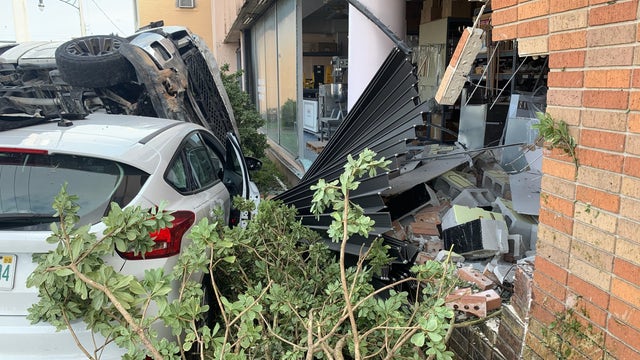 Two cars crash into Daytona Beach business causing extensive damage