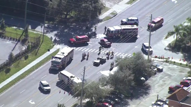 2 injured, roadway shutdown after crash in Orlando