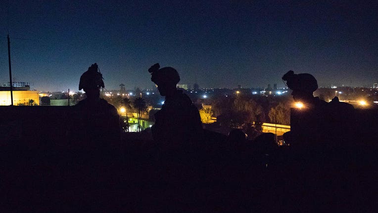U.S. Marines with 2nd Battalion, 7th Marines, assigned to the Special Purpose Marine Air-Ground Task Force-Crisis Response-Central Command reinforce the Baghdad Embassy Compound in Iraq, Dec. 31, 2019.