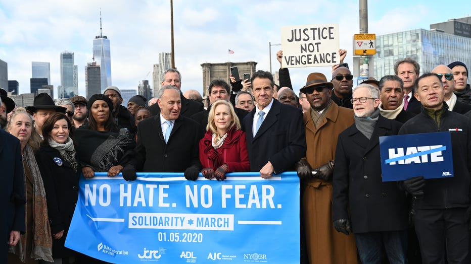 Gov. Andrew Cuomo , Lt. Gov. Kathy Hochul and U.S. Senators Kirsten Gillibrand and Chuck Schumer participate in in the No Fear, No Hate Solidarity March over the Brooklyn Bridge.