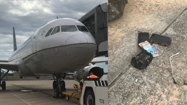 Plane makes emergency landing at Florida airport after battery catches fire in passenger's bag, airport says