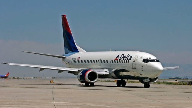 Delta reduces flights to Korea as virus outbreak spreads