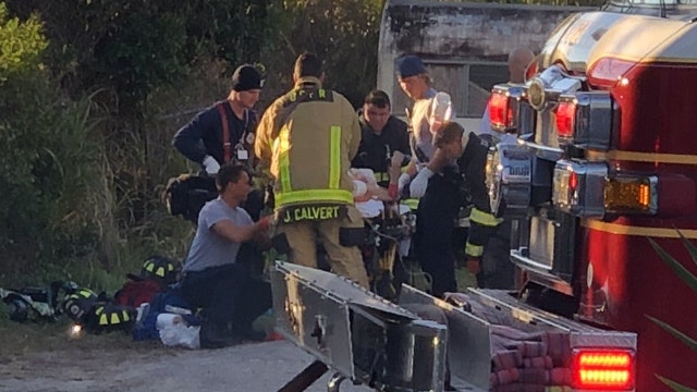 Woman injured after bedroom fire in Titusville, officials say