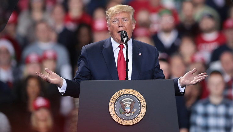 4a951b00-FILE: President Donald Trump addresses his impeachment during a Merry Christmas Rally at the Kellogg Arena on December 18, 2019 in Battle Creek, Michigan. While Trump spoke at the rally the House of Representatives voted to impeach the president, making Trump just the third president in U.S. history to be impeached. (Photo by Scott Olson/Getty Images)