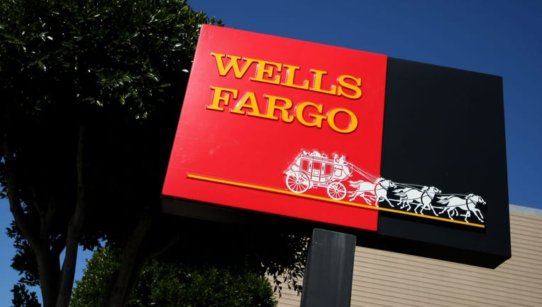 FILE: A sign is displayed outside of a Wells Fargo bank April 16, 2008 in San Francisco, California. San Francisco-based Wells Fargo and Company, the fifth largest bank in the U.S., reported an eleven percent drop in first quarter earnings as they continue to struggle with loan losses as the housing market slumps. The company reported earnings of $2 billion, or 60 cents per share, down from $2.24 billion, or 66 cents per share one year ago. (Photo by Justin Sullivan/Getty Images)